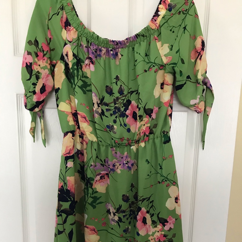 Vibrant, flowing knee length dress.